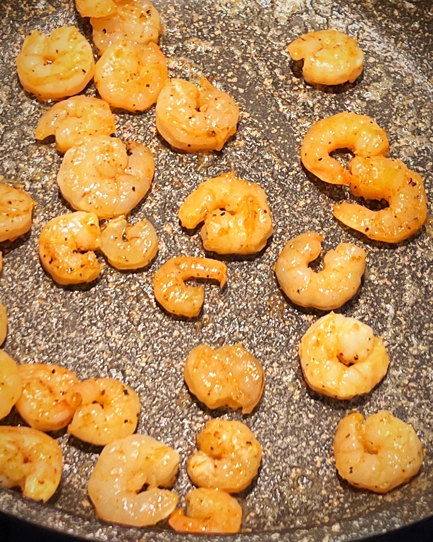 Remove the shrimp from the pan and set aside.